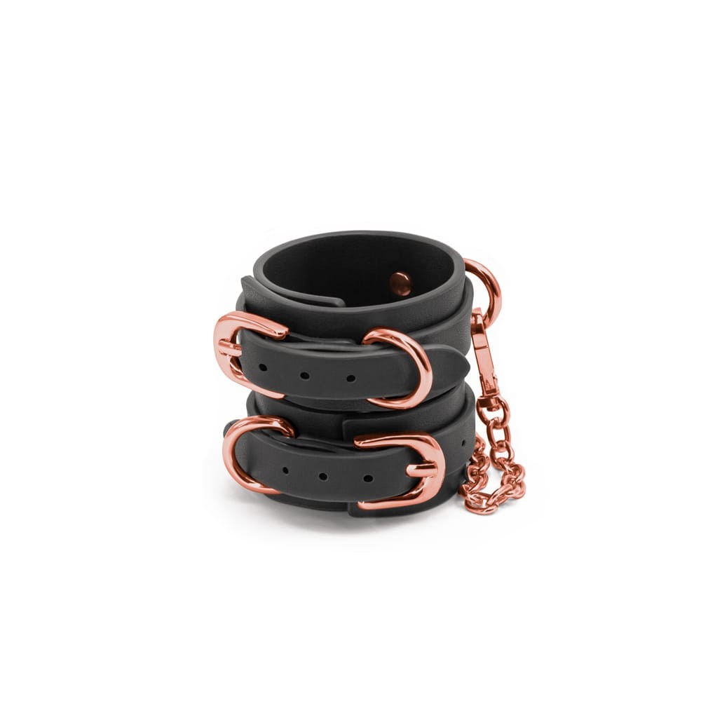 Catuse Bondage Couture Wrist Cuffs NS Toys Negru - Auriu din Metal si Imitatie Piele 657447104565